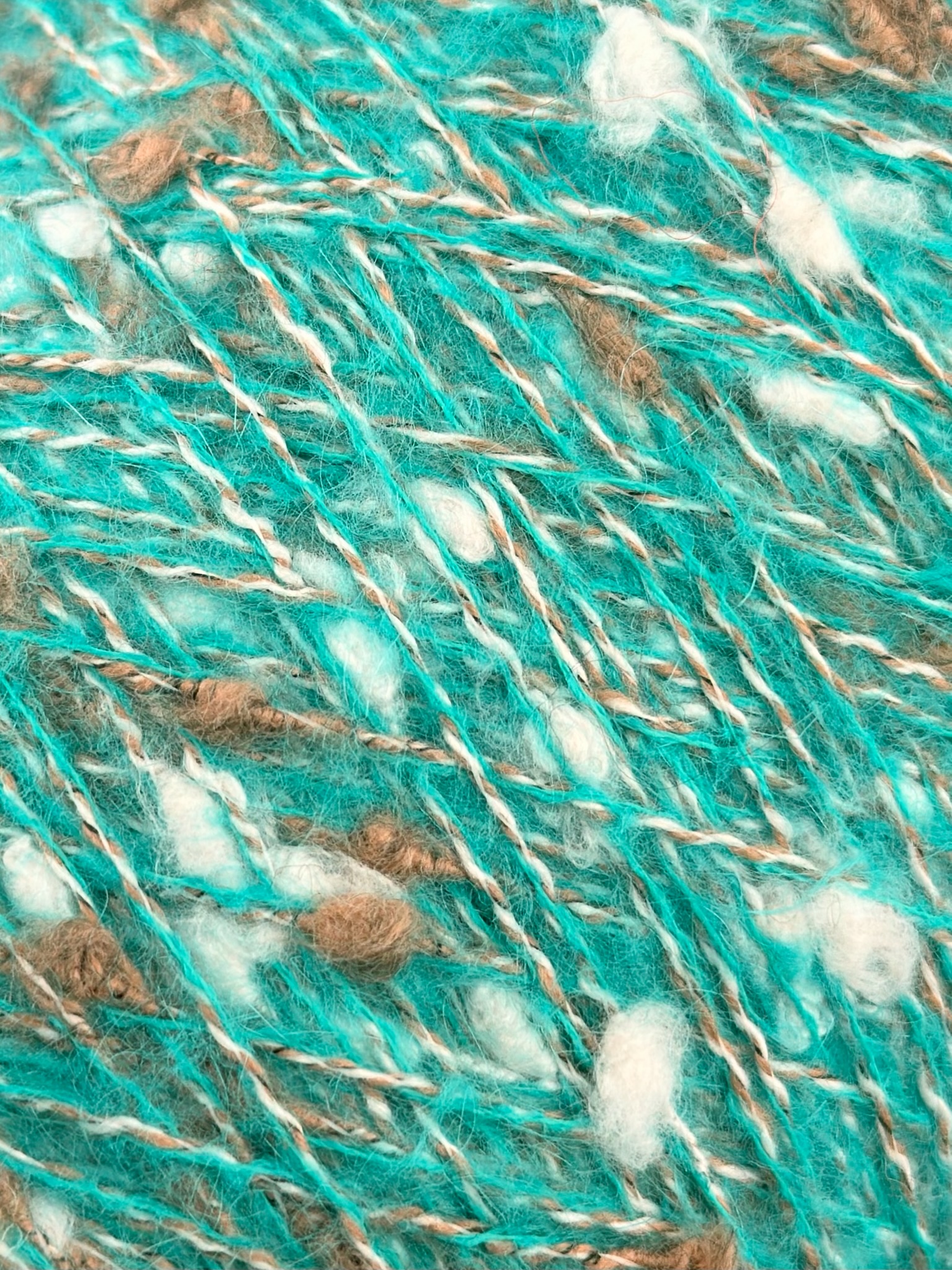 New Mill Fuego Nm 2500 – Fantasiegarn Bouclé mit Kaschmir, Wolle und Kid Mohair col. Aquatürkis